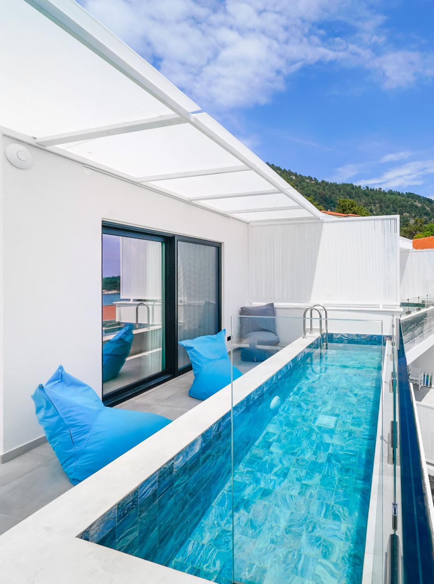 Mythodea Prive Luxury Suites Chrysi Ammoudia Exterior photo