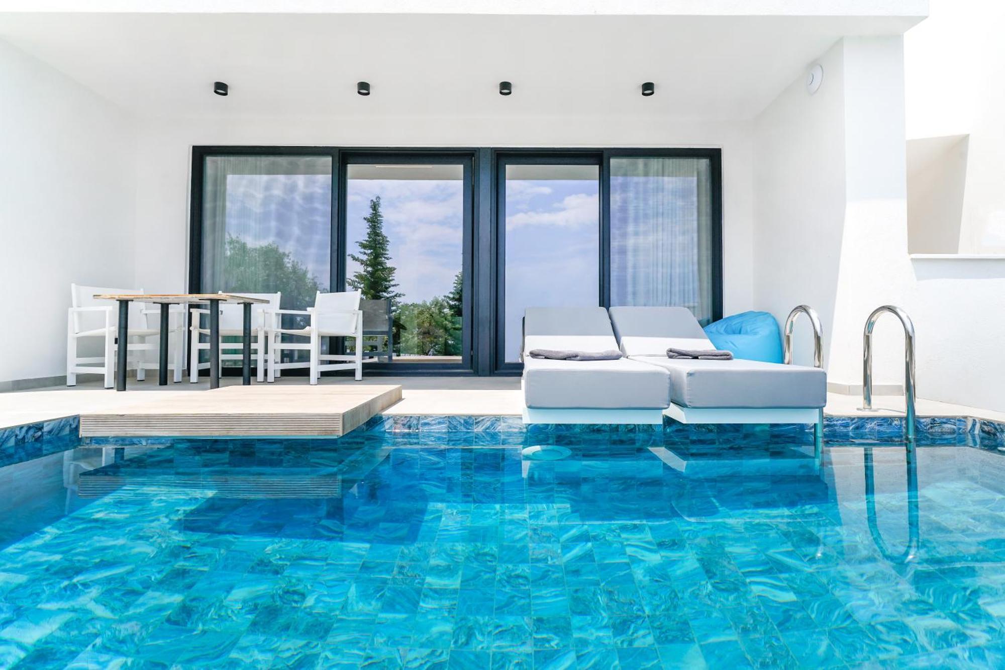 Mythodea Prive Luxury Suites Chrysi Ammoudia Exterior photo